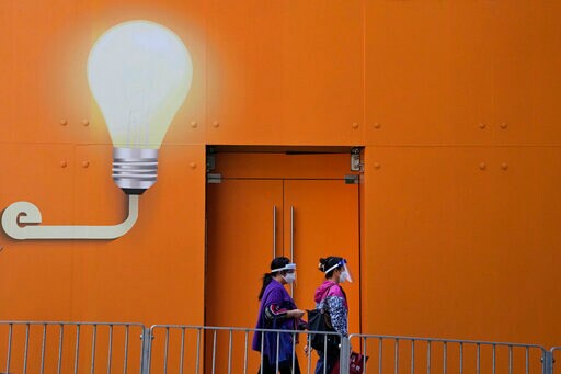 China Tightens Controls as More Virus Cases Reported