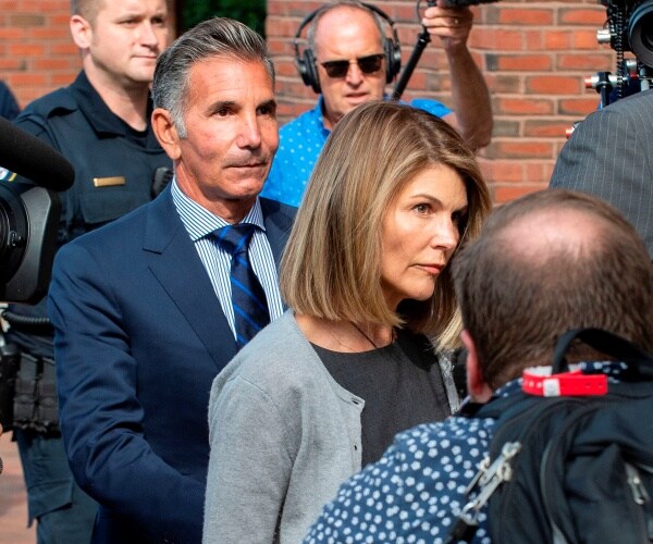 loughlin in a gray cardigan and giannulli in a blue suit and tie