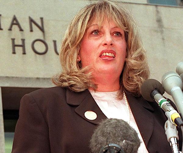 Linda Tripp speaks to the press after concluding her testimony before President Bill Clinton's grand jury