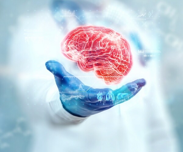 surgical-gloved hand holding hologram of brain