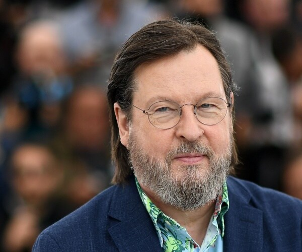 lars von trier poses for the cameras