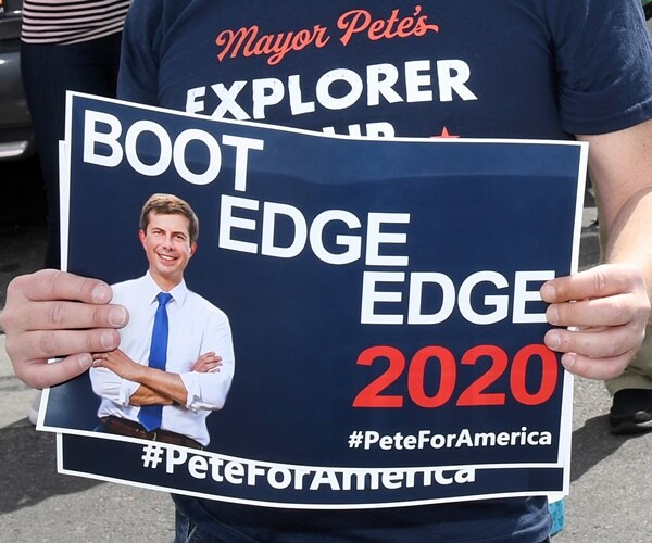 a sign shows how to say pete buttigieg's name