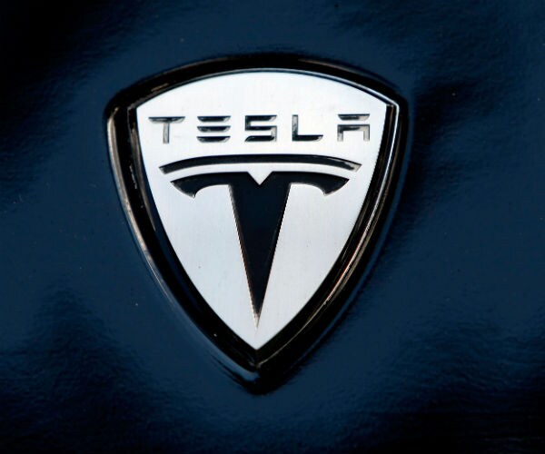 tesla's emblem is shown