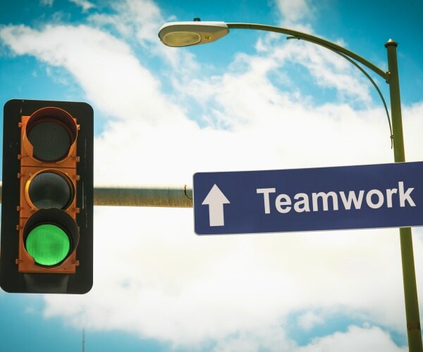 street sign the direction way to teamwork