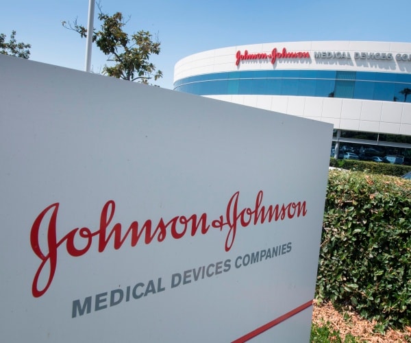 johnson and johnson company logo on a board outside a company building