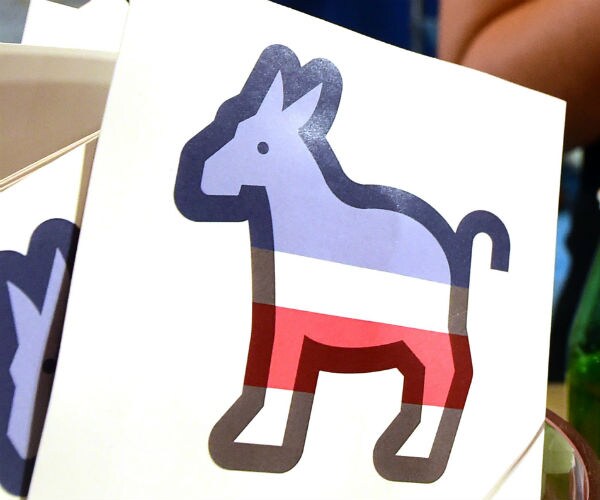 A sign with a democratic donkey logo