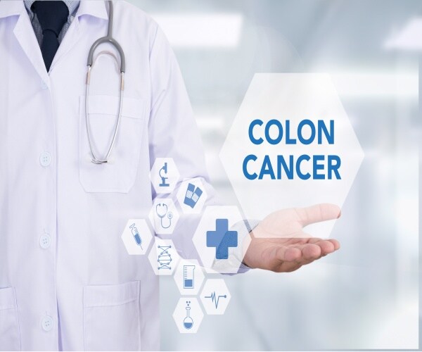 Colon cancer with blue background of stethoscope, medications, etc. 