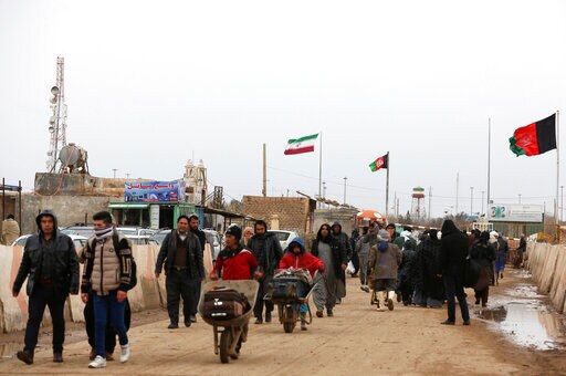 Afghans Recruited by Iran for Syria war Return Home Pariahs