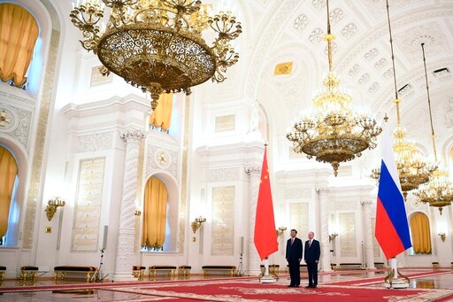 Putin Hosts Xi in the Kremlin with Imperial Palace Pageantry