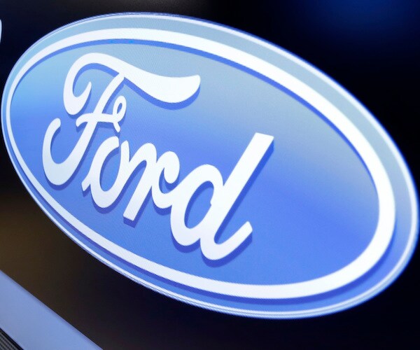 the logo for ford motor company in blue with white lettering