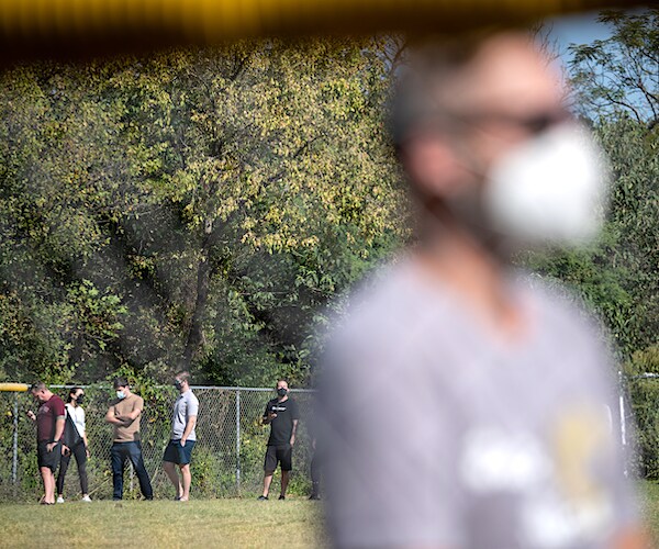 voters in texas wait in line for early voting