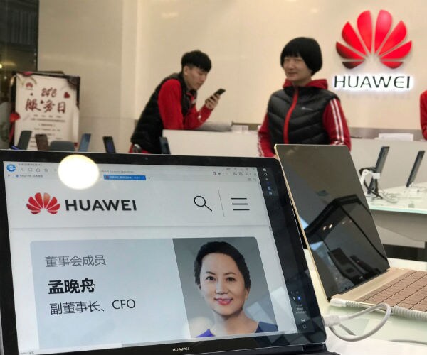 profile of huawei cfo meng wanzhou displayed on a huawei computer at a huawei store in beijing