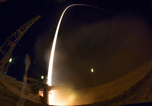 2 Americans, Russian Dock with International Space Station