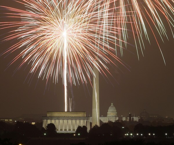 fireworks explode over the washington, d.c. mall and lincoln memorial