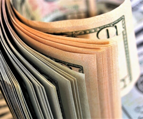 roll of different dollar bills