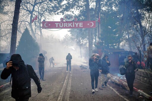 Turkey's Erdogan Says Europe Borders Open as Refugees Gather