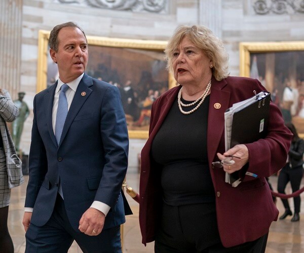 adam schiff and zoe lofgren talk and walk during the impeachment trial of donald trump