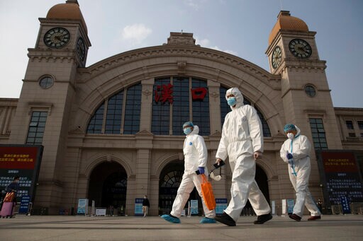 China Says WHO Experts to Visit Wuhan in Virus Origins Probe