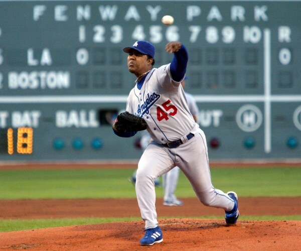 Odalis Perez rears back in the first inning at Fenway Park