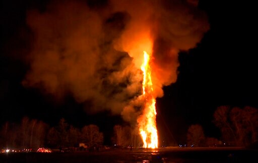 Austrian Town Claims Tallest Bonfire after 3 Months' Work