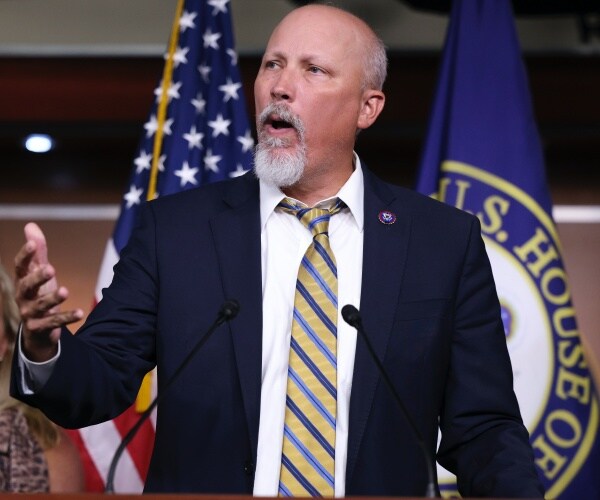 Chip Roy speaks at a press conference