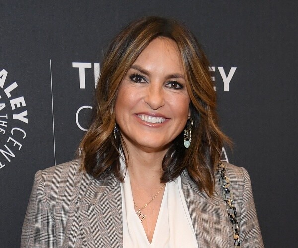 mariska hargitay stands on red carpet