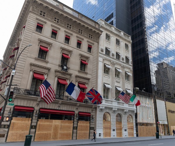 new york city boarded up retail storefront looting prevention measure 