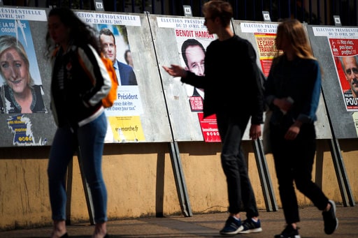 The Latest: Centrist Macron Talks France's Future with Obama