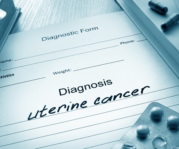 doctor's pad with diagnosis uterine cancer