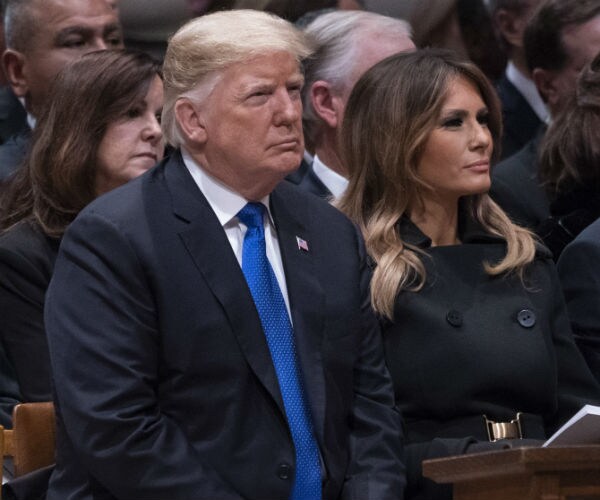 president donald trump and first lady melania trump at george h.w. bush funeral