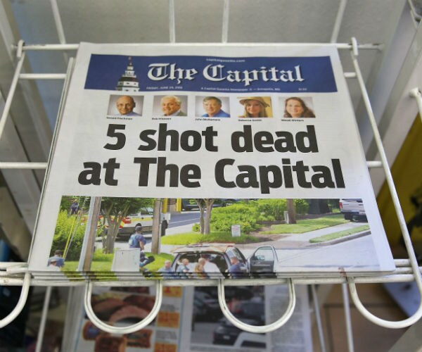 Professionalism of Slain Newspaper Employees Recalled