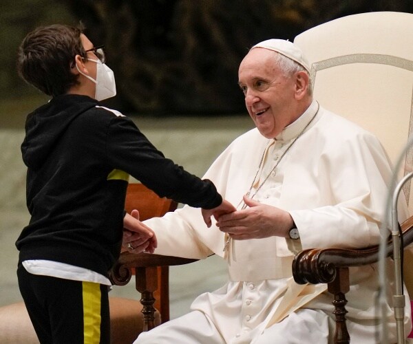 Pope Francis talks with 10-year-old boy