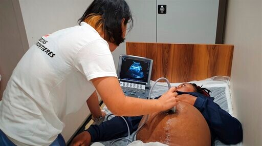 The Latest: Woman Gives Birth after Airlift from Rescue Ship