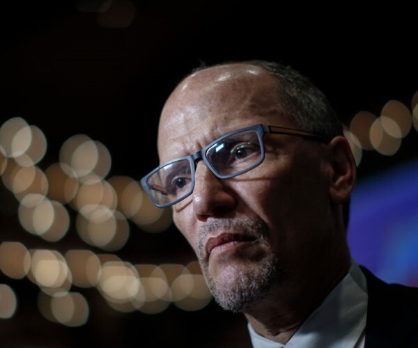 tom perez speaks with the media in the spin room ahead of the first democratic debate