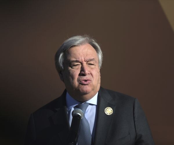 un secretary-general antonio guterres addresses delegates during the opening session of a un migration conference.