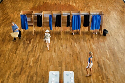 The Latest: Macron Casts Ballot in French Parliamentary Vote