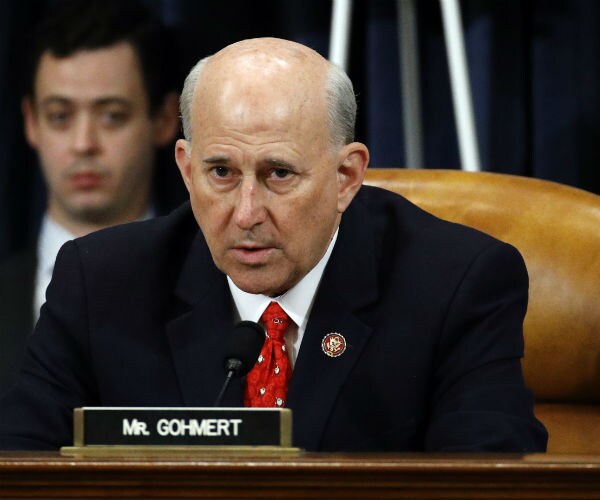 Rep. Louie Gohmert, R-Texas is seen in dark suit, white dress shirt and red tie 