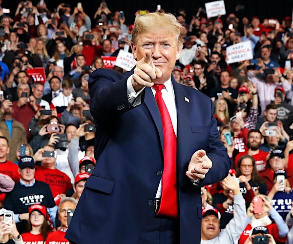 president donald trump points during a campaign rally
