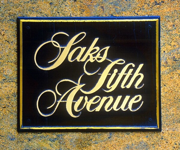 digitally altered image of saks fifth avenue sign 

