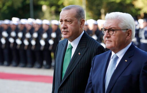 The Latest: Erdogan Says Germany Must Cooperate on 'terror'