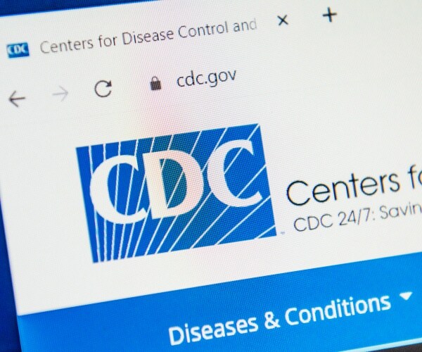 computer with Centers for Disease Control and Prevention homepage on screen