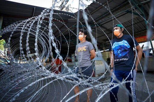 Malaysia Imposes Total Lockdown after Cases Soar above 8,000