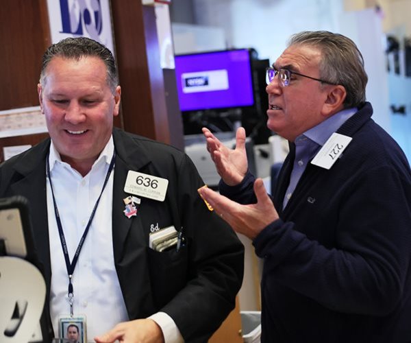 Wall Street Climbs on Subdued Inflation Data