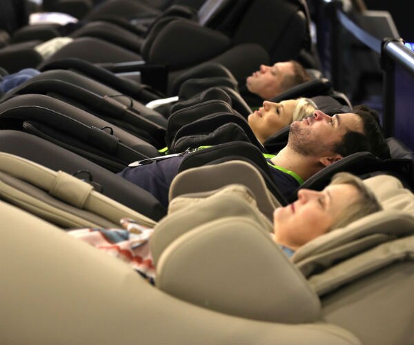 laying down in massage chairs