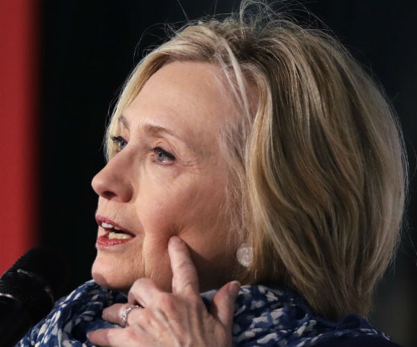 hillary clinton is show during an interview