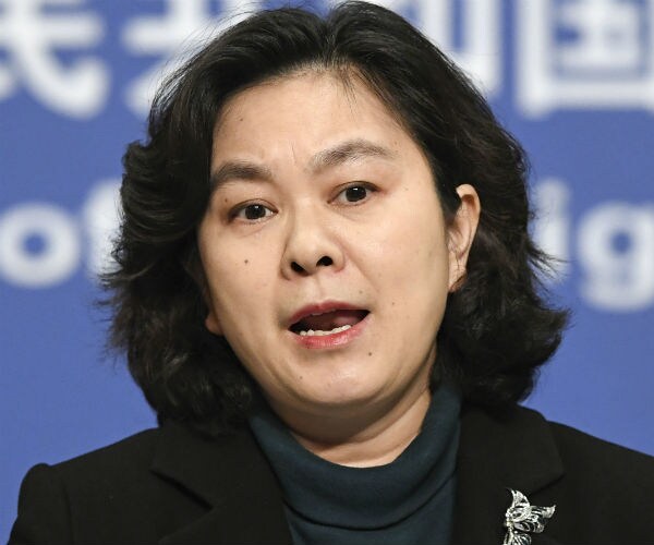 chinese foreign ministry spokeswoman hua chunying speaks at a press conference in beijing