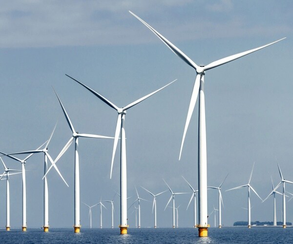 wind turbines are shown in the sea