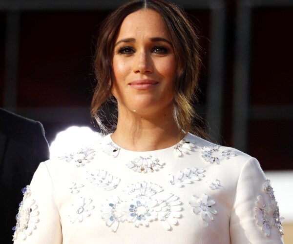 Meghan Markle speaking on stage