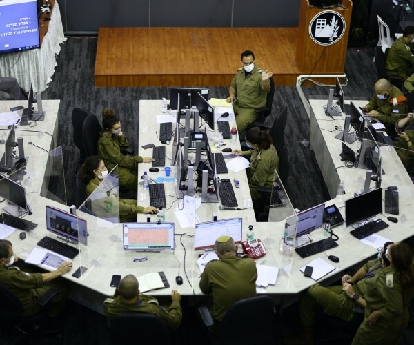 israeli covid task force in a meeting