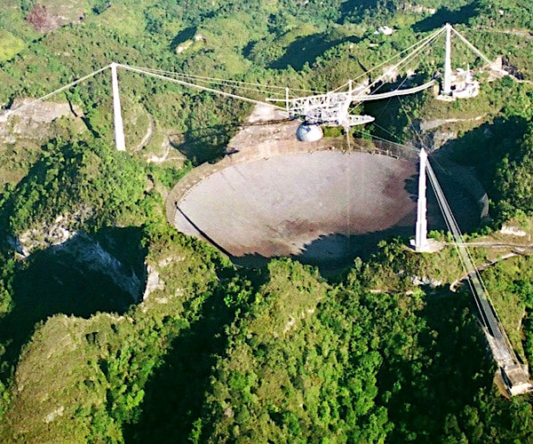 The world's largest radio telescope is seen from the air, at the Arecibo Observatory, in Puerto Rico